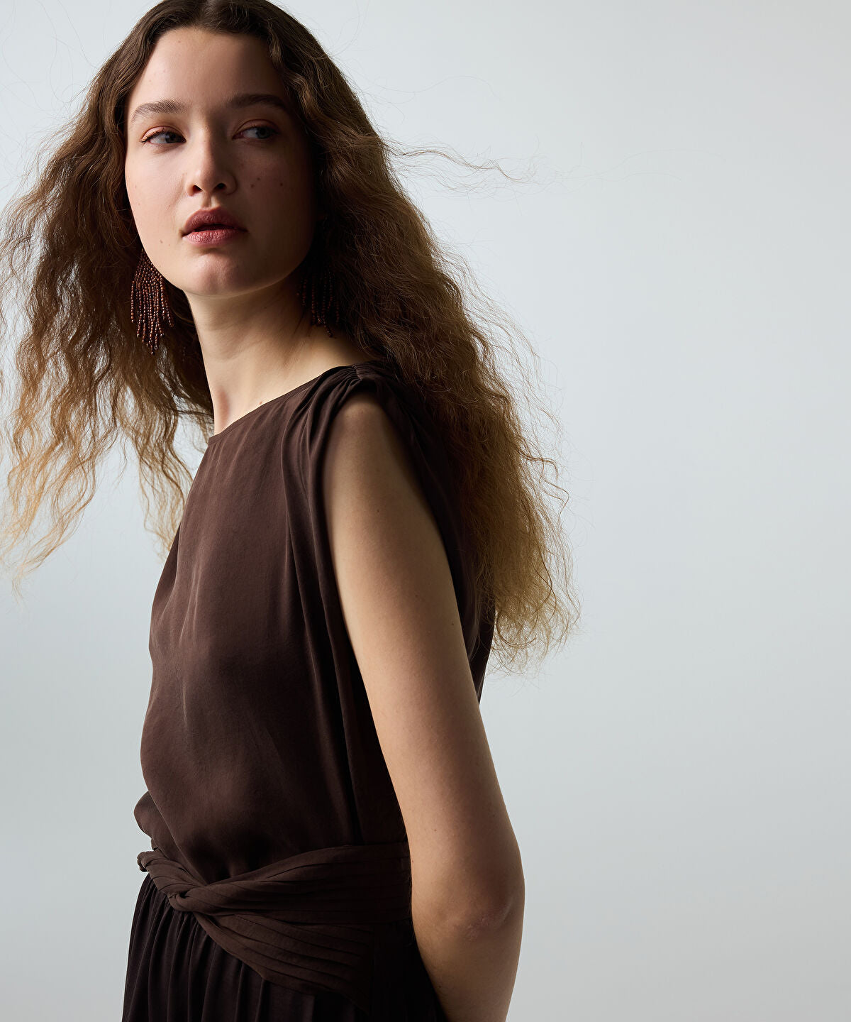 Zoomed Asymmetric Sleeve Blouse