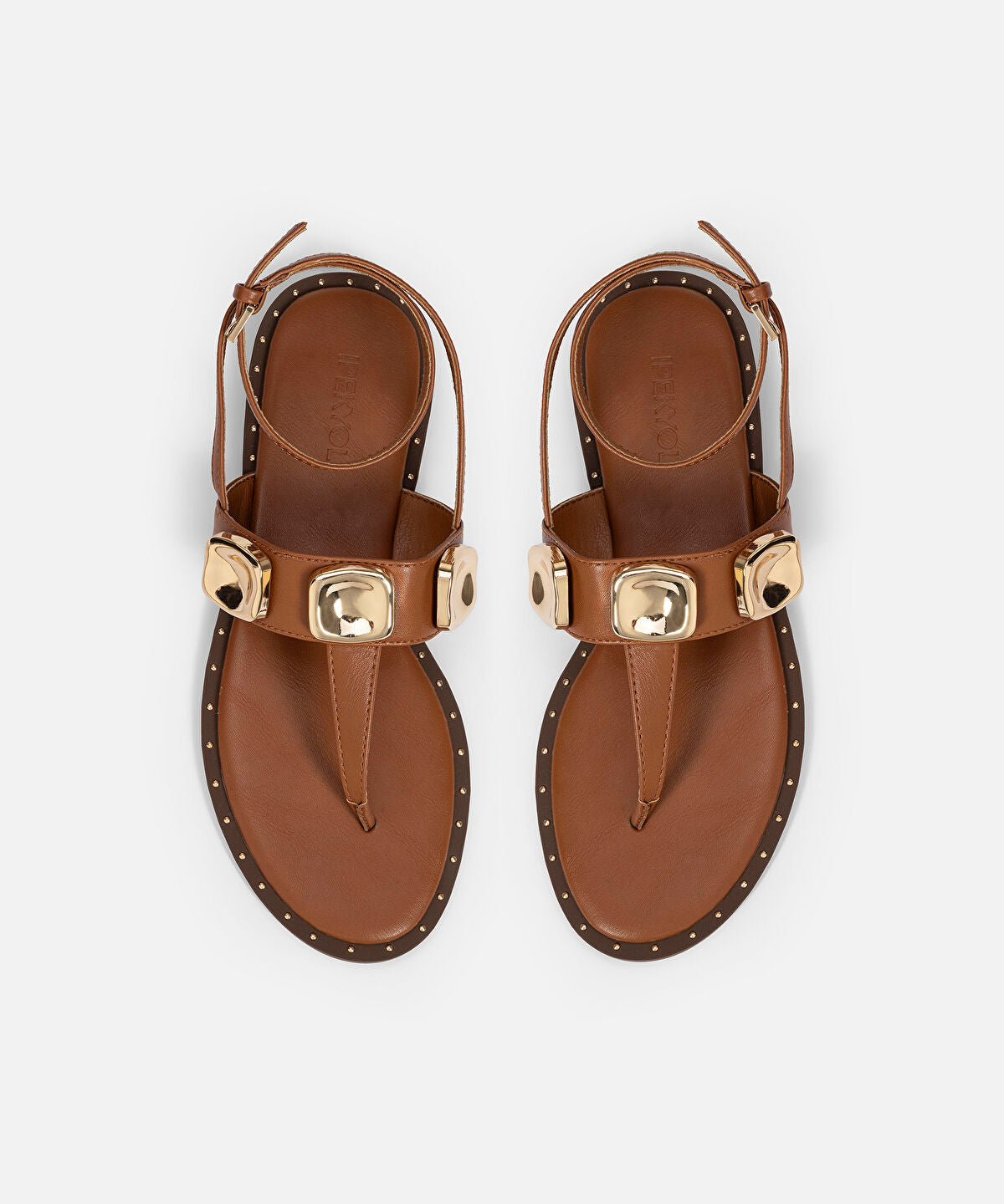 Zoomed Metal Accent Sandals