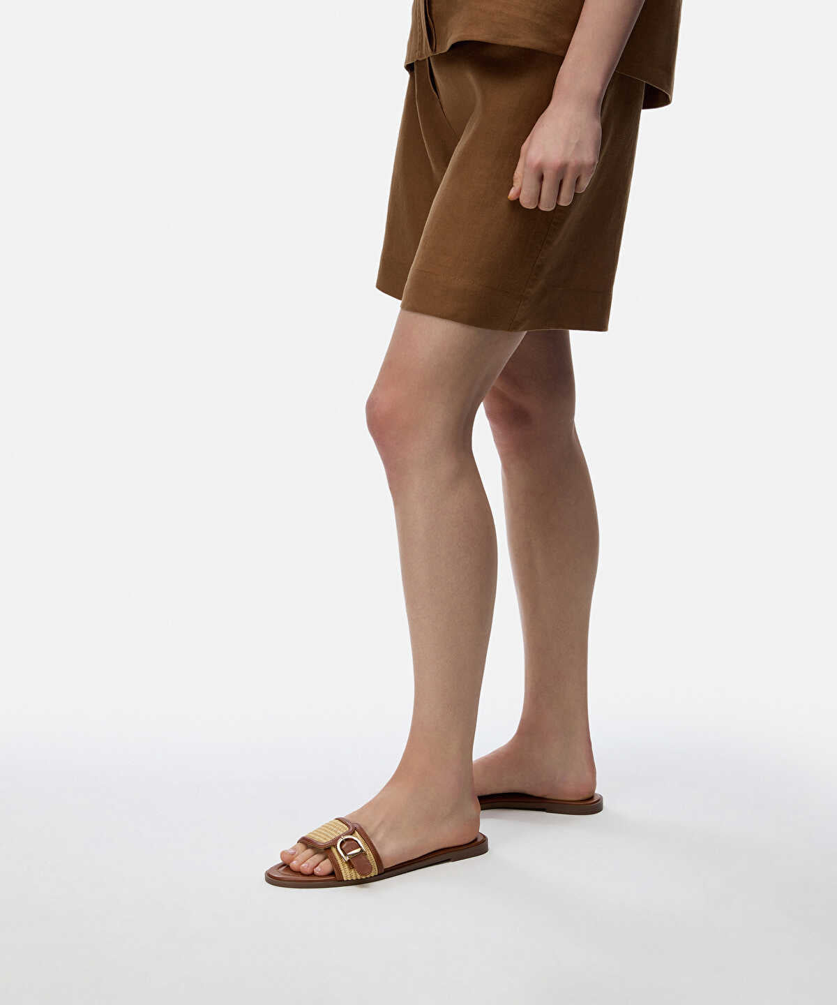 Zoomed Contrast Texture Buckle Slides