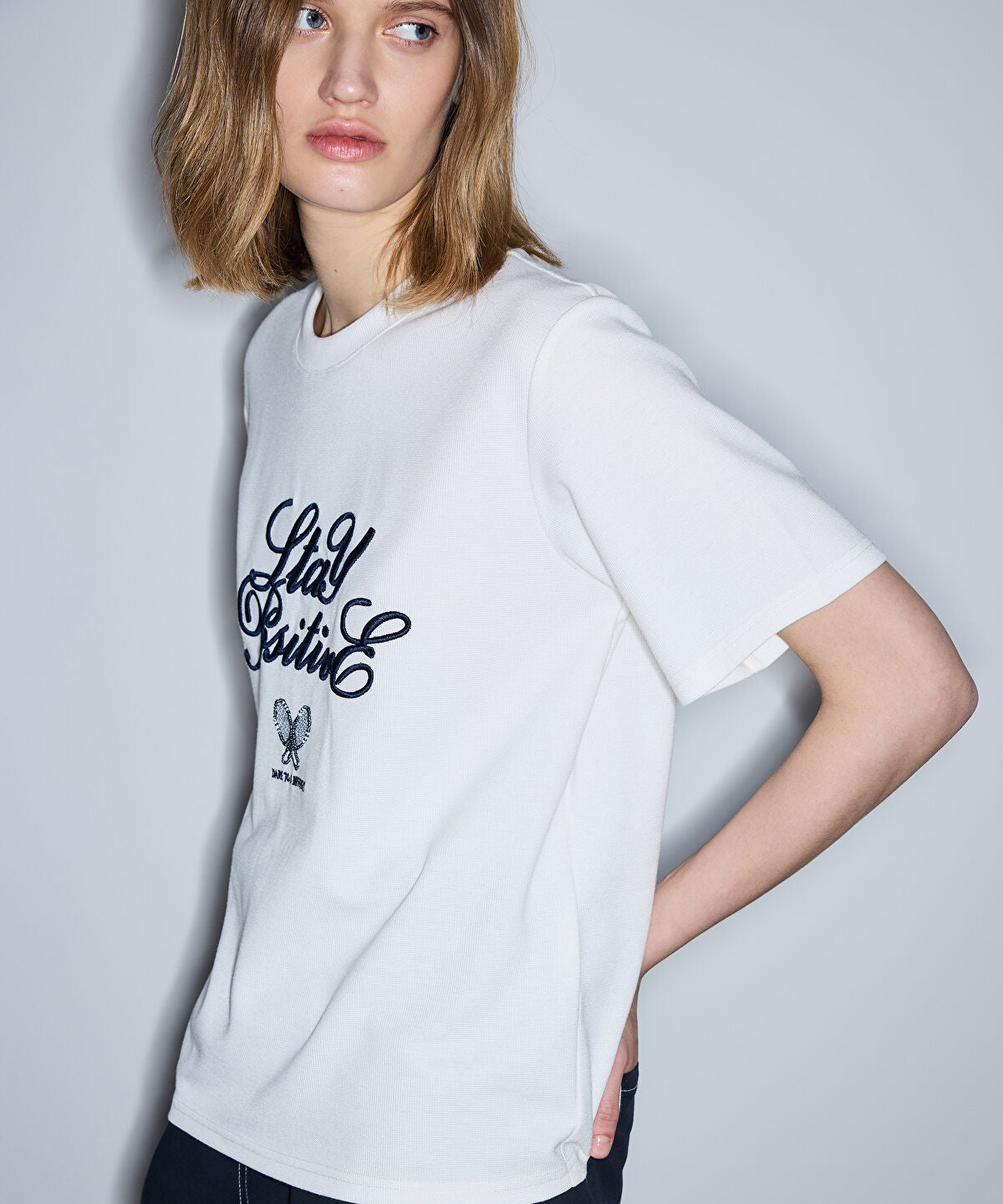 Zoomed Embroidered Slogan T-Shirt
