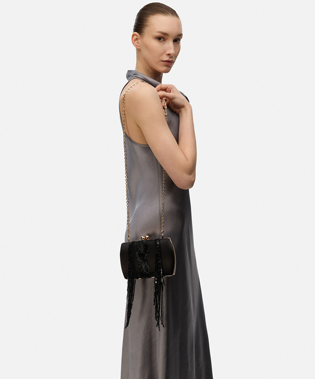 Zoomed Beaded Dangle Clutch