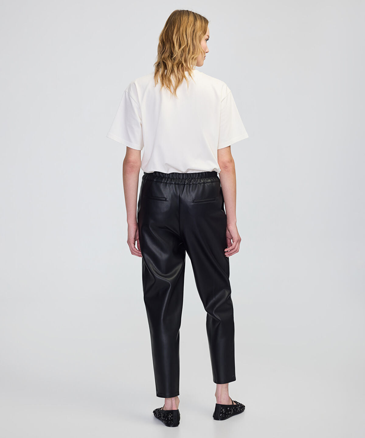 Zoomed Leather-Effect Carrot-Fit Trousers