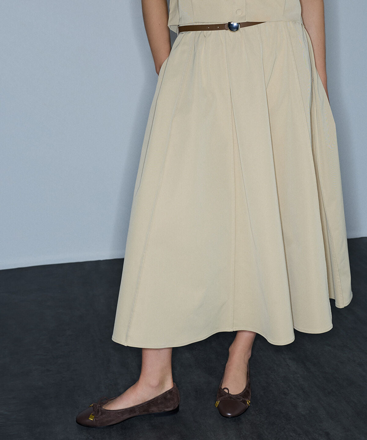 Zoomed Faux-Leather Belted Midi Skirt